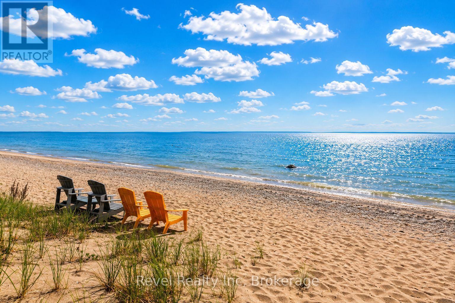 200 ft of private beach and mesmerizing views - 731 Concession 15 W, Tiny, ON - Outdoor With Body Of Water With View