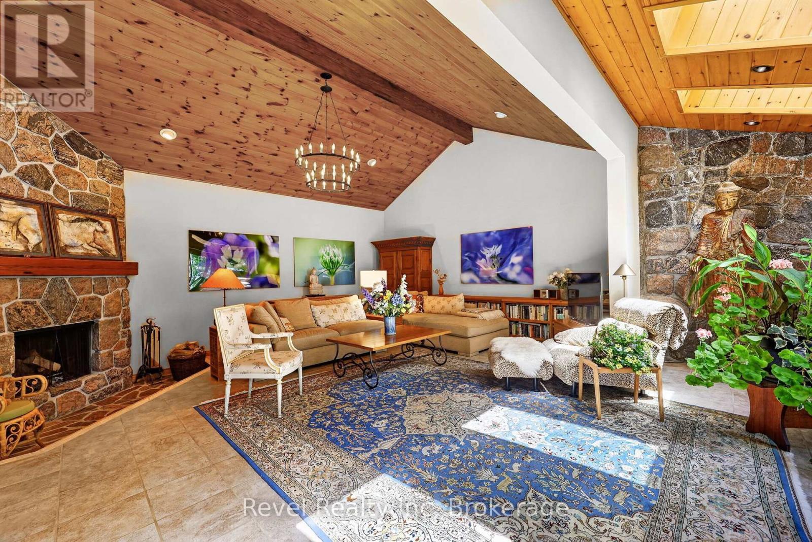 Cathedral Ceilings and beautiful Fireplace - 731 Concession 15 W, Tiny, ON - Indoor Photo Showing Living Room With Fireplace