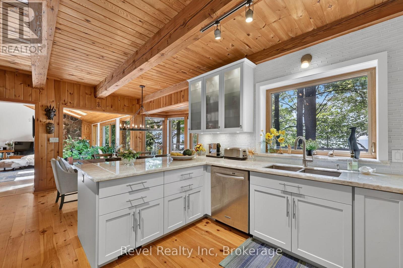 Overlooking the bay - 731 Concession 15 W, Tiny, ON - Indoor Photo Showing Kitchen With Double Sink With Upgraded Kitchen