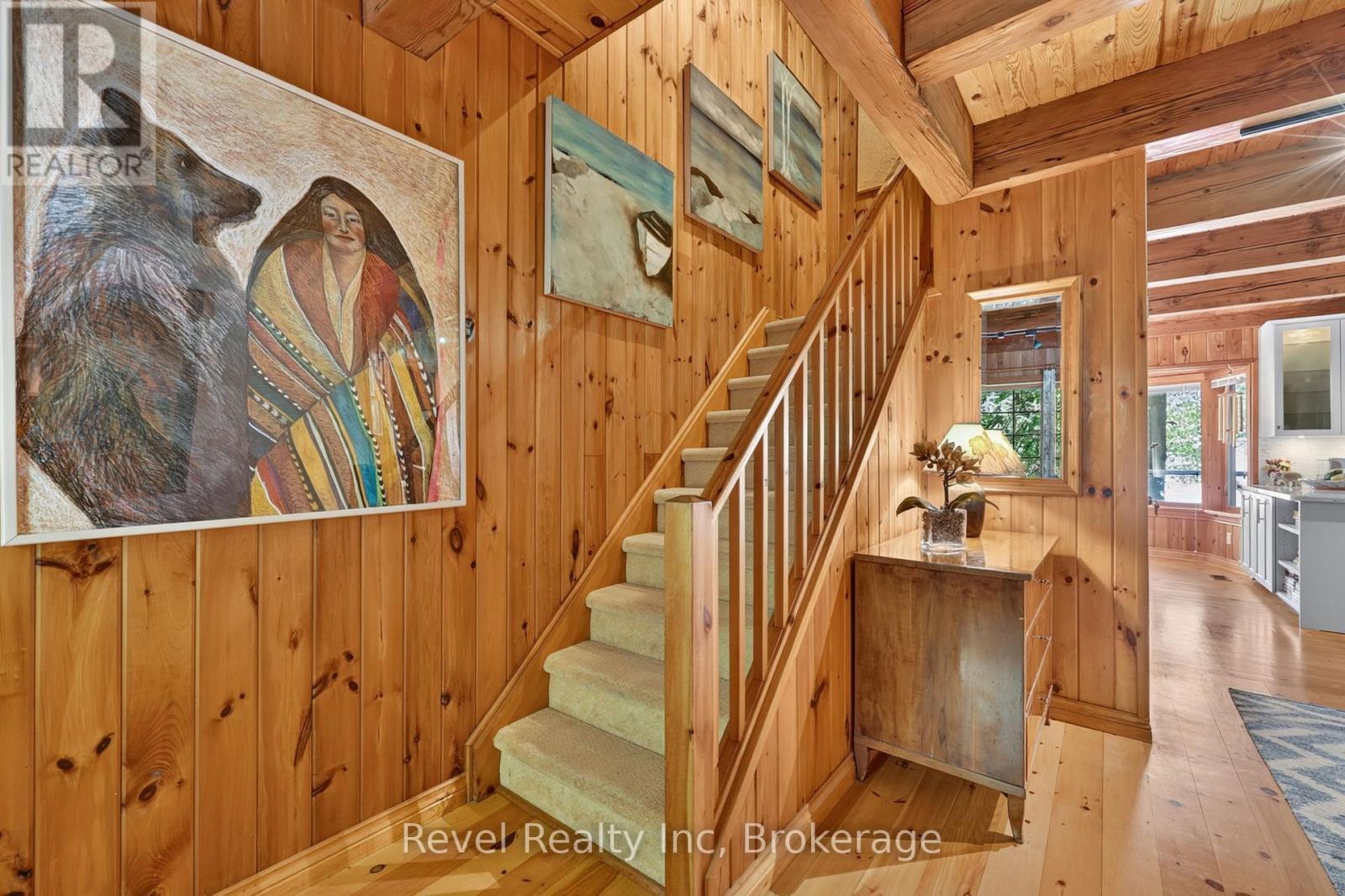 Staircase going to the second floor in main home - 731 Concession 15 W, Tiny, ON - Indoor Photo Showing Other Room