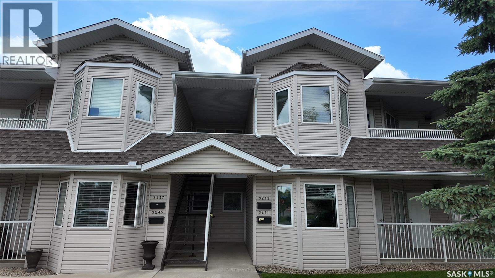3241 Woodhams Drive E, Regina, SK - Outdoor With Balcony With Facade