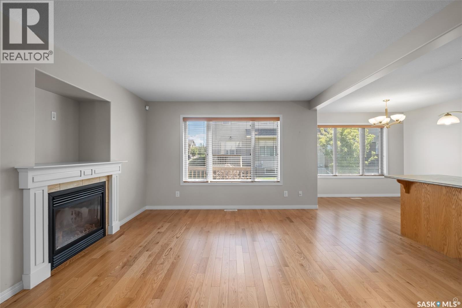 51 1600 Muzzy Drive, Prince Albert, SK - Indoor Photo Showing Other Room With Fireplace