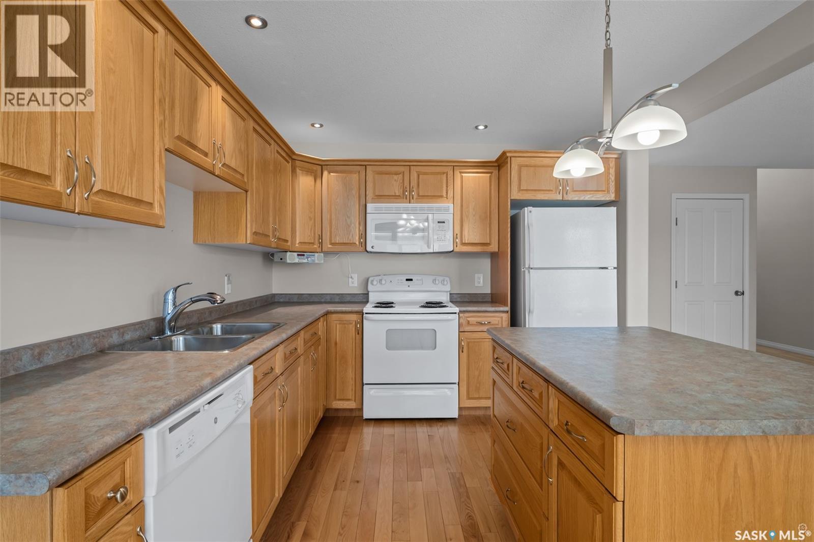 51 1600 Muzzy Drive, Prince Albert, SK - Indoor Photo Showing Kitchen With Double Sink