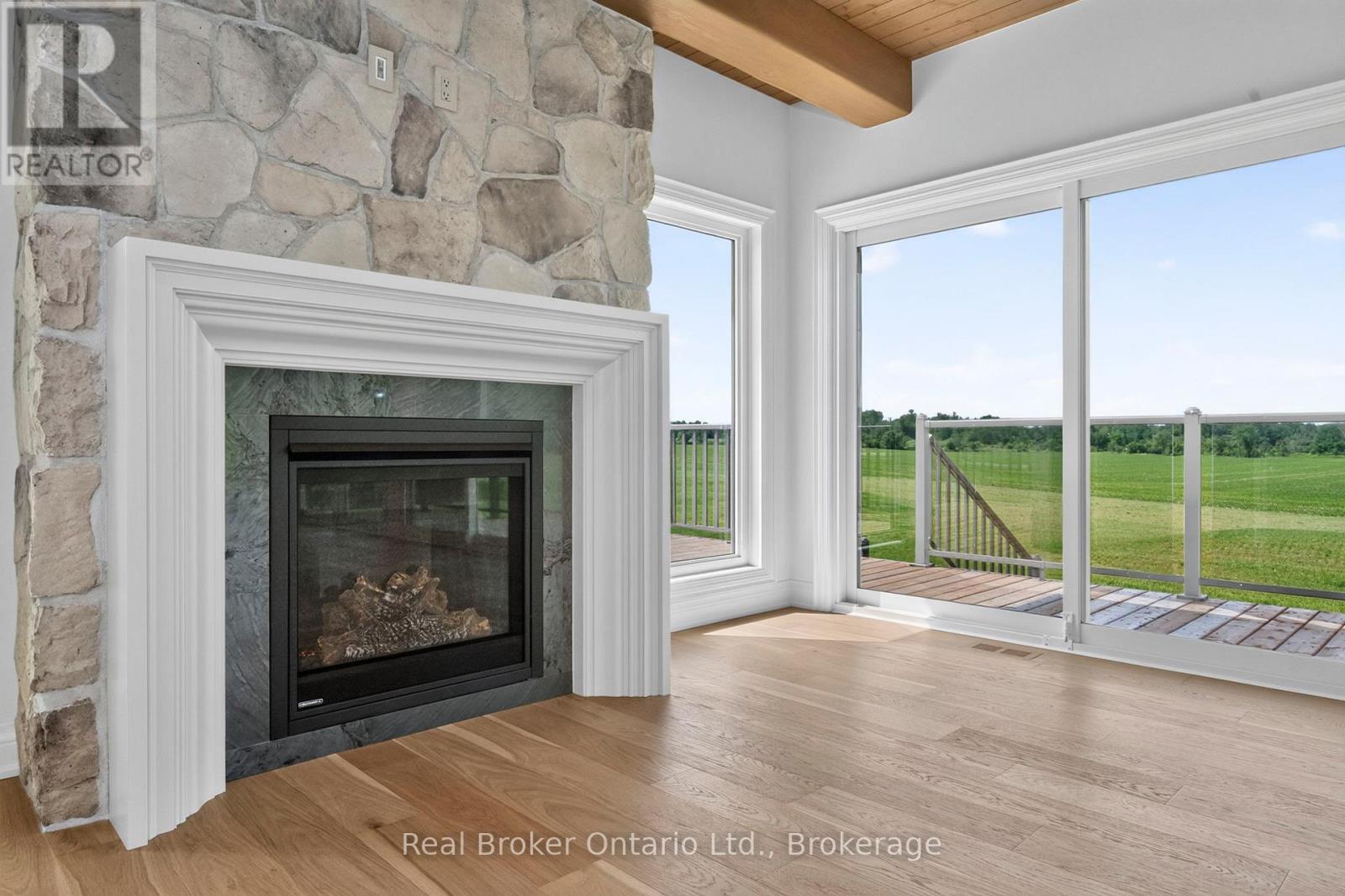 Natural Stone FP w/Gas Insert - Elec Outlet Above - 930 Marshall Road, Tiny, ON