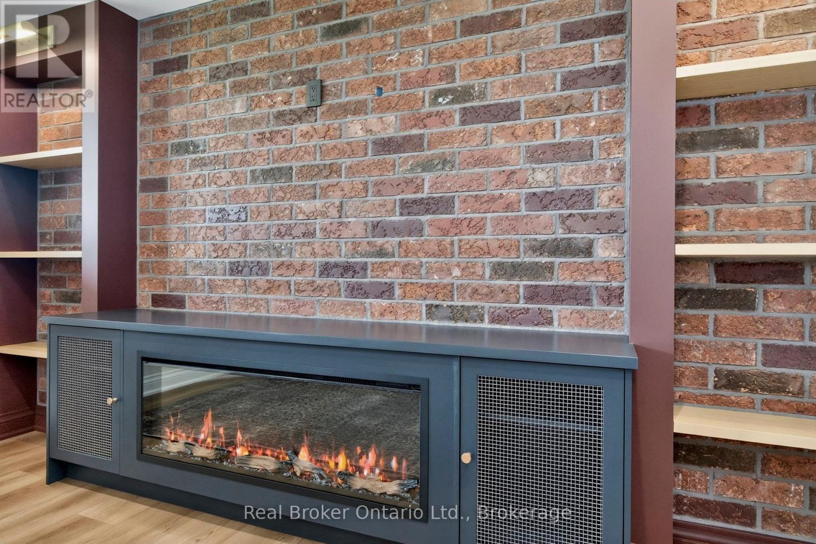 Electric Fireplace Console / Electric Outlet Above - 930 Marshall Road, Tiny, ON