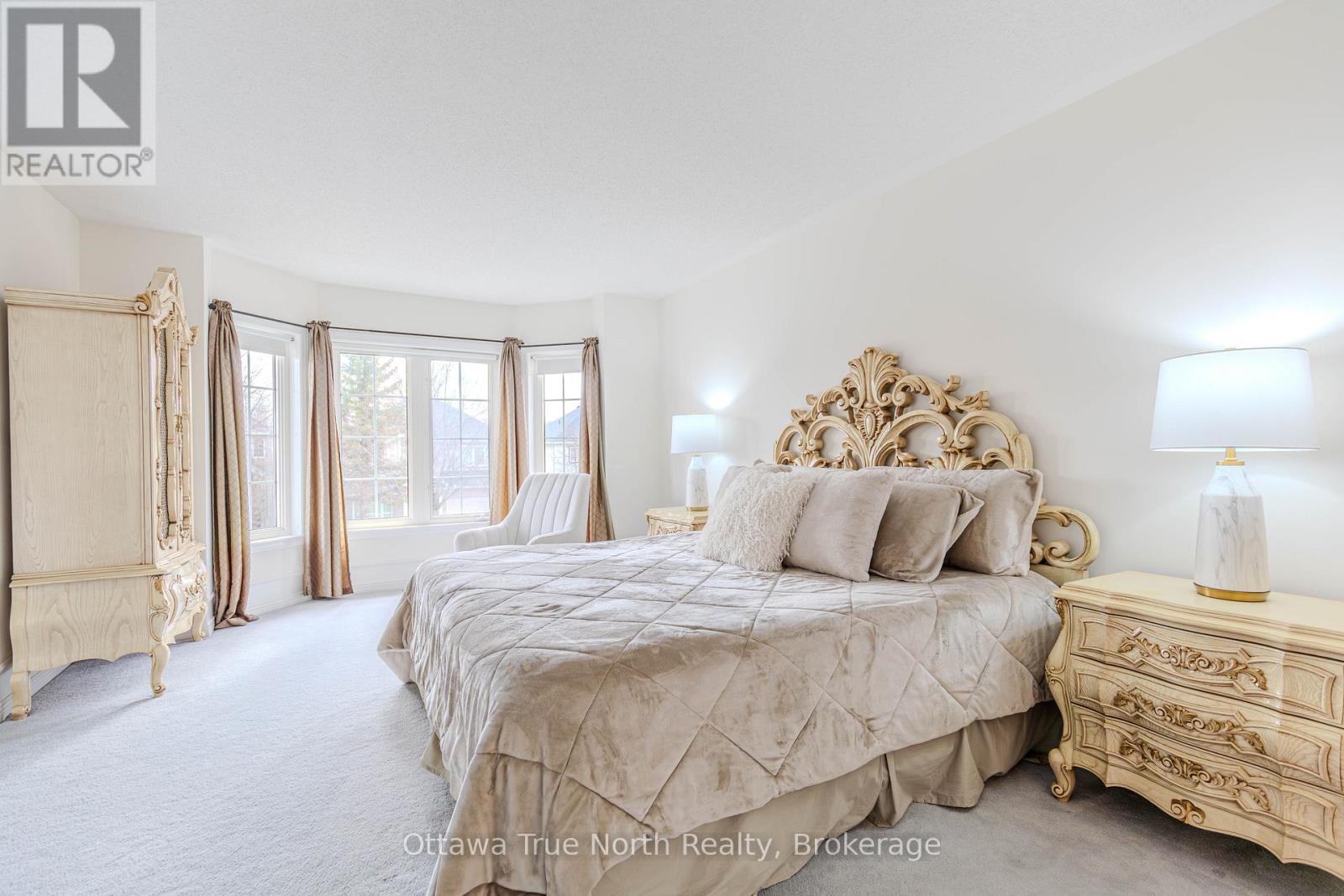 Luxurious primary bedroom w/ bay windows! - 19 Black Tern Crescent, Ottawa, ON