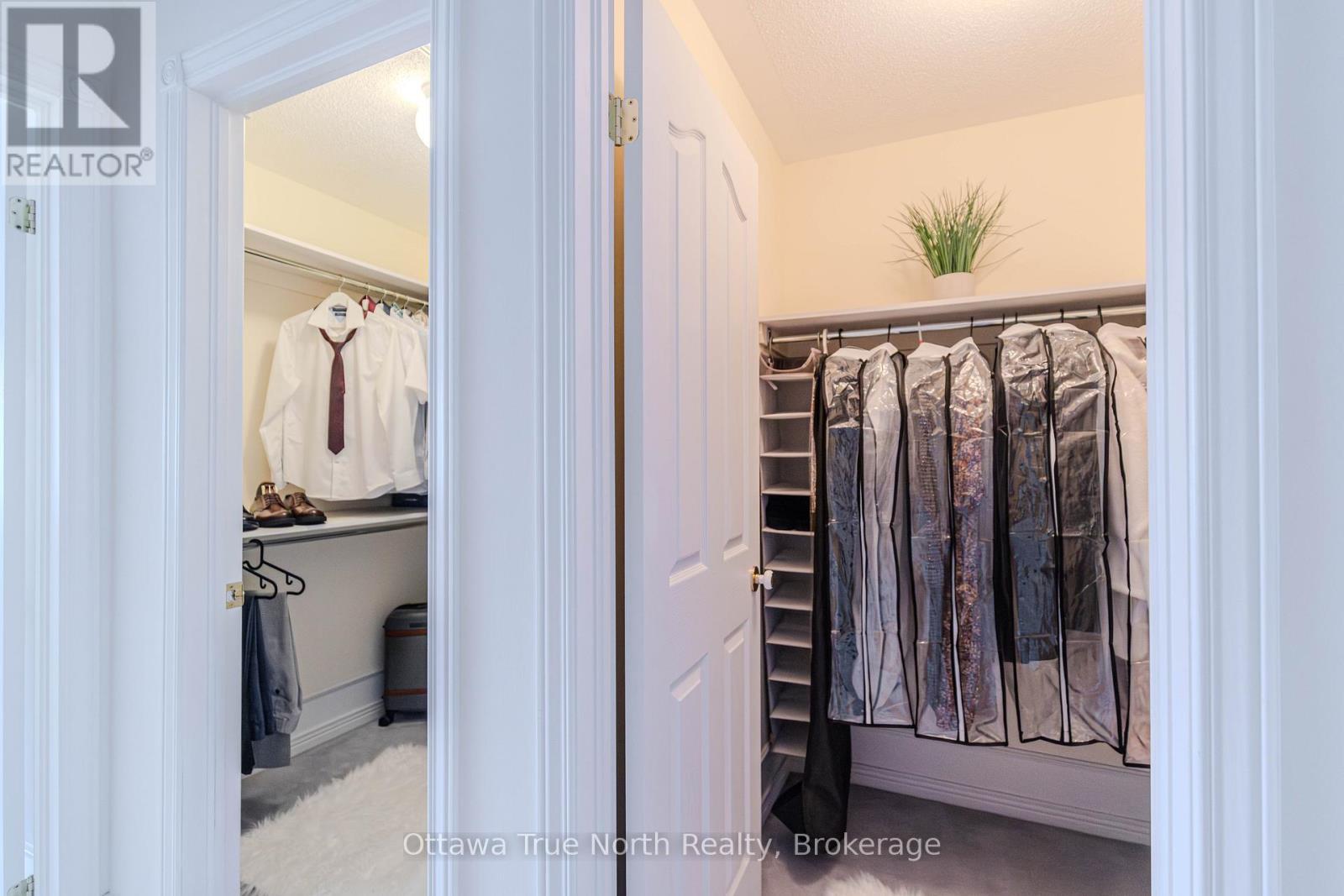 Well organized master bedroom walk in closet! - 19 Black Tern Crescent, Ottawa, ON