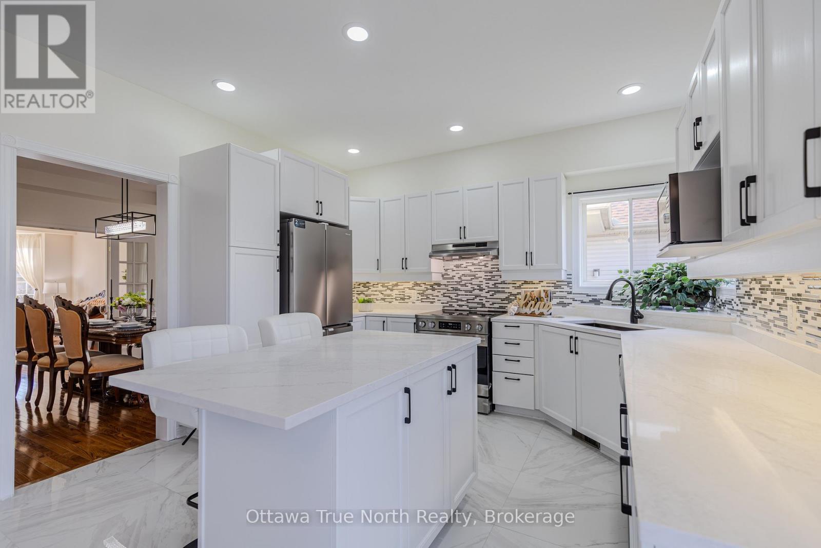 Renovated kitchen with new appliances - 19 Black Tern Crescent, Ottawa, ON