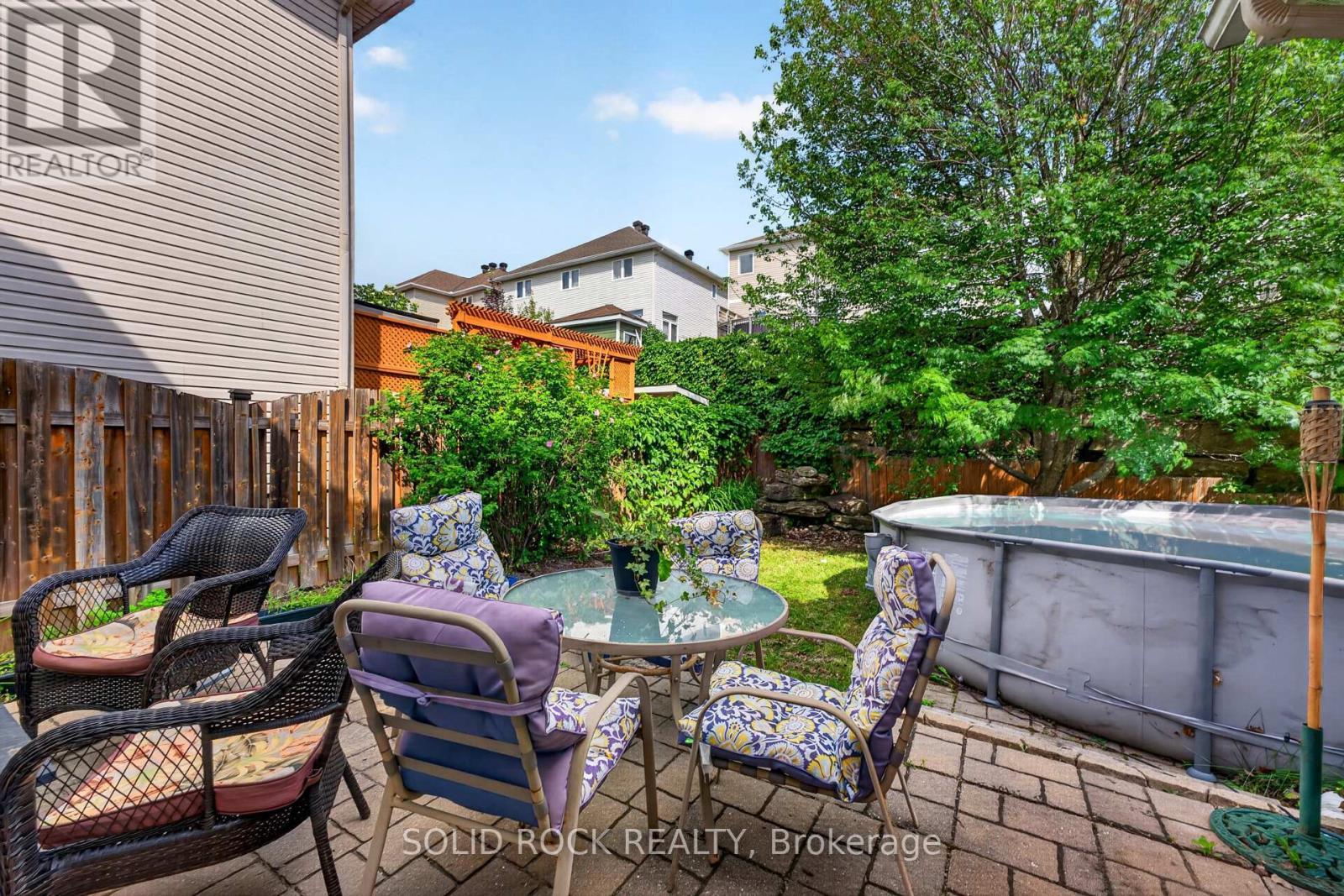 Rock garden and mature tree - 191 Yoho Drive, Ottawa, ON