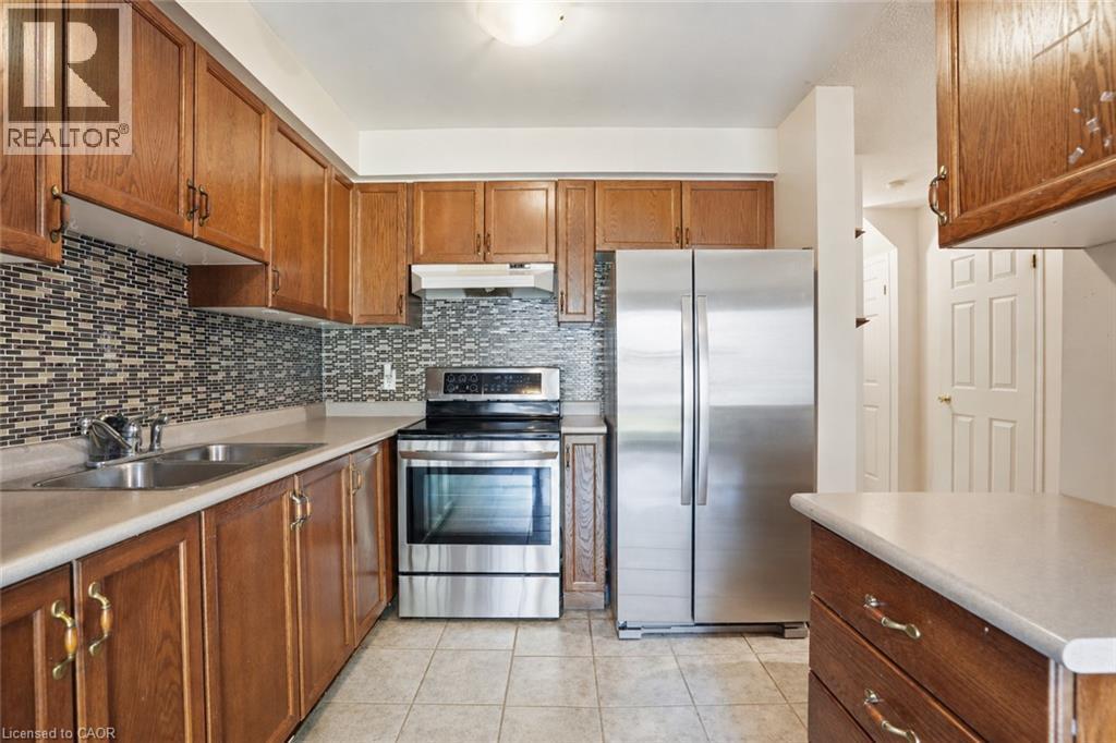 565 Rymal Road E Unit# 2, Hamilton, ON - Indoor Photo Showing Kitchen With Double Sink