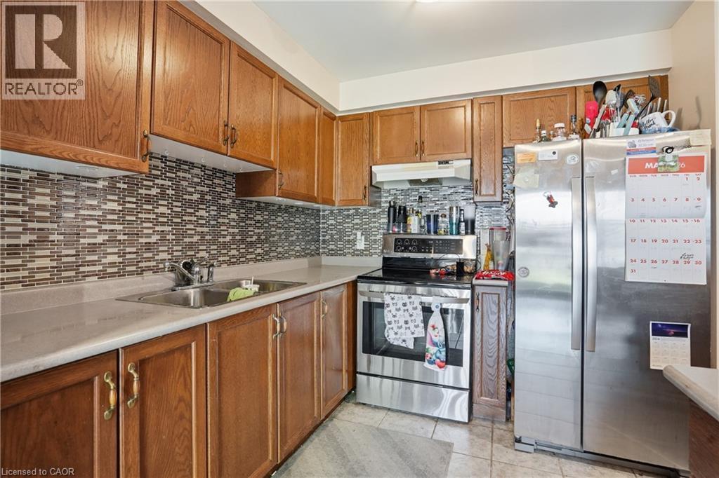 565 Rymal Road E Unit# 2, Hamilton, ON - Indoor Photo Showing Kitchen With Double Sink