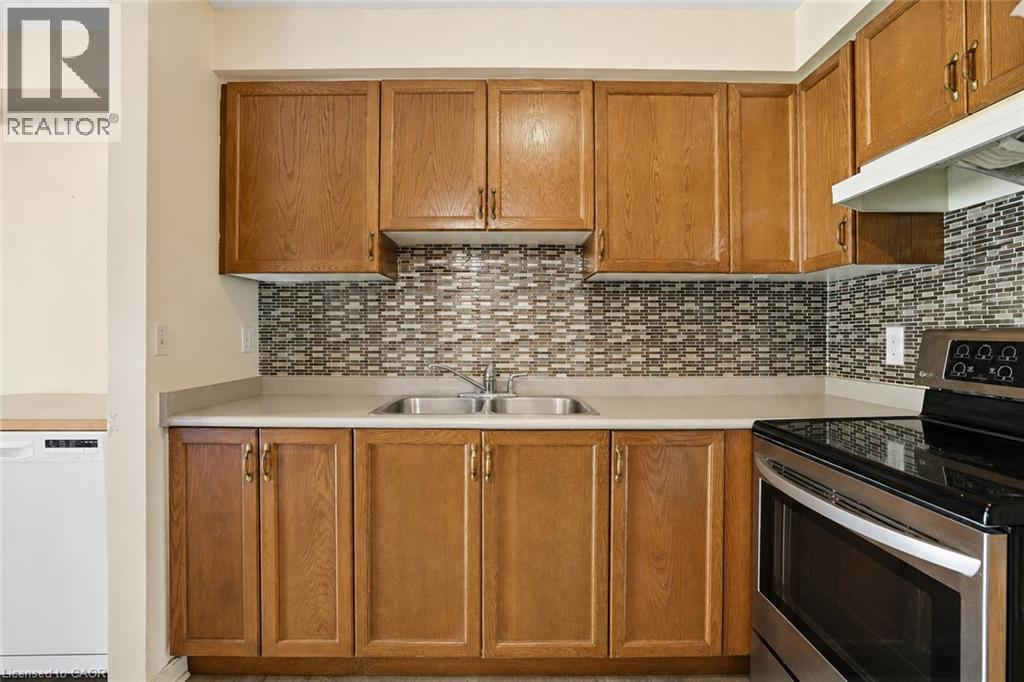 565 Rymal Road E Unit# 2, Hamilton, ON - Indoor Photo Showing Kitchen With Double Sink