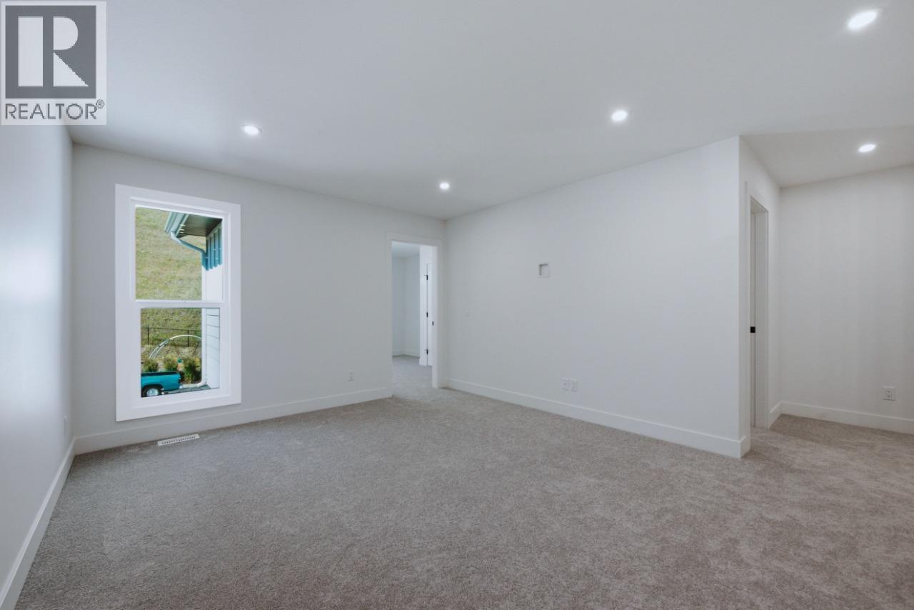 377 Arrowleaf Rise, Coldstream, BC - Indoor Photo Showing Other Room