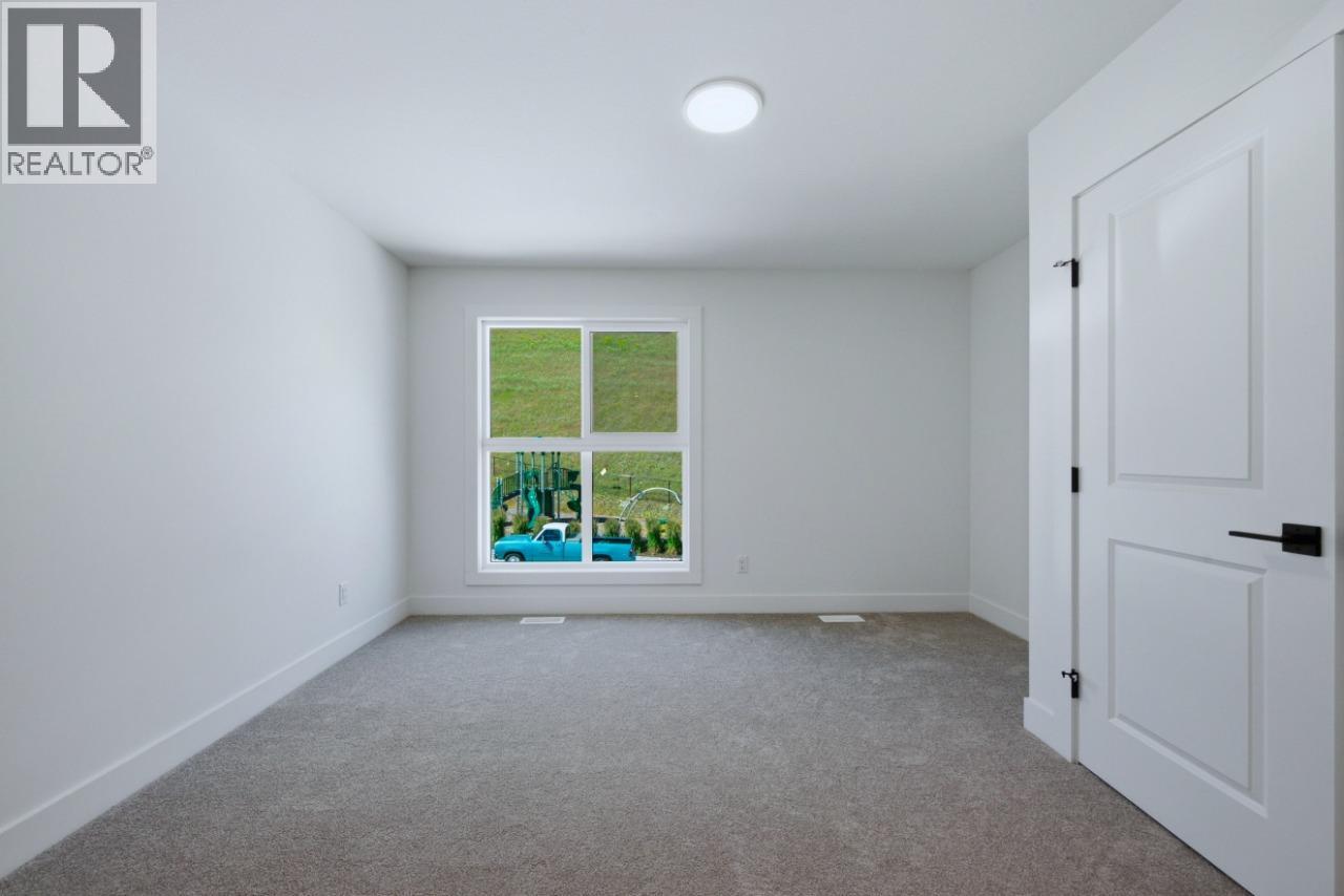 377 Arrowleaf Rise, Coldstream, BC - Indoor Photo Showing Other Room