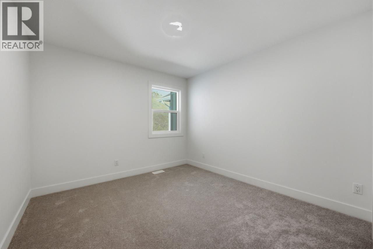 377 Arrowleaf Rise, Coldstream, BC - Indoor Photo Showing Other Room