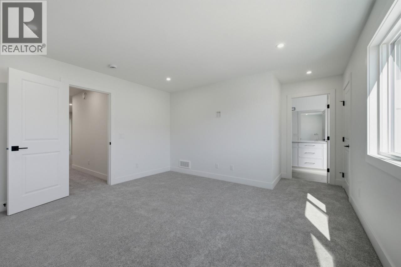 377 Arrowleaf Rise, Coldstream, BC - Indoor Photo Showing Other Room
