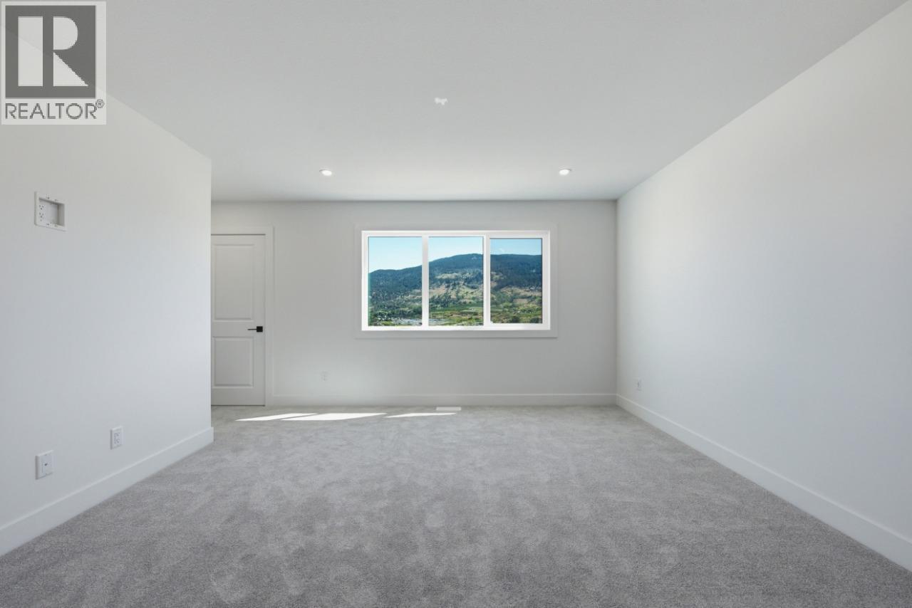 377 Arrowleaf Rise, Coldstream, BC - Indoor Photo Showing Other Room