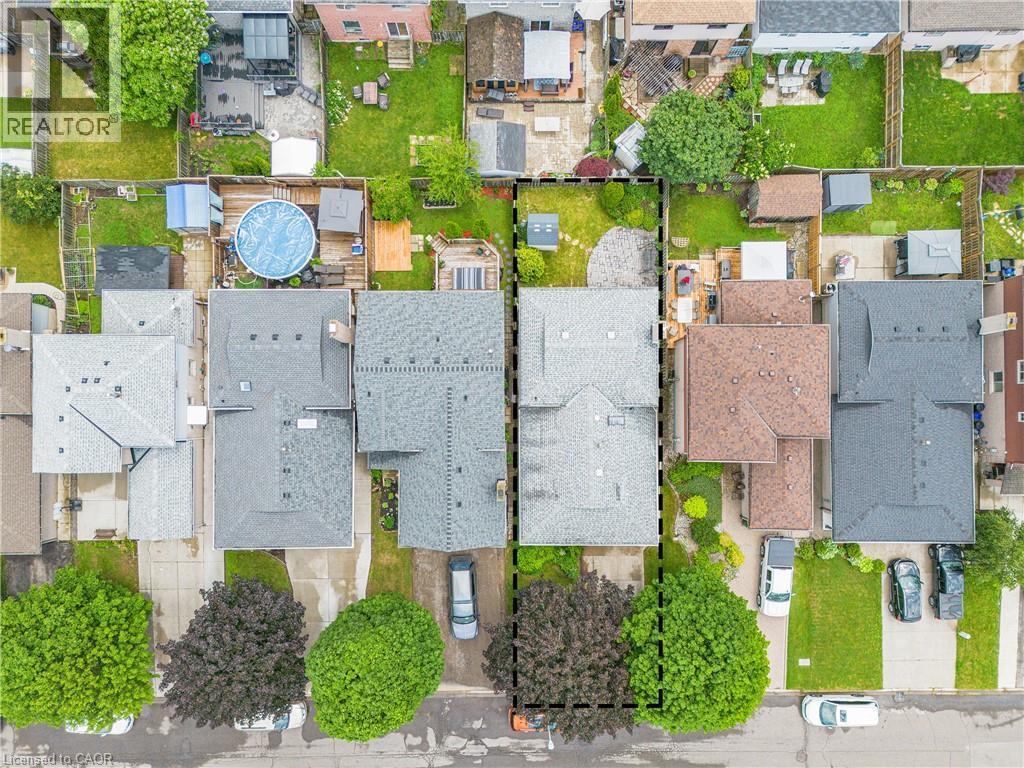 Aerial perspective showcasing property boundaries and surrounding residential landscape - 23 Millpond Place, Mountain, ON