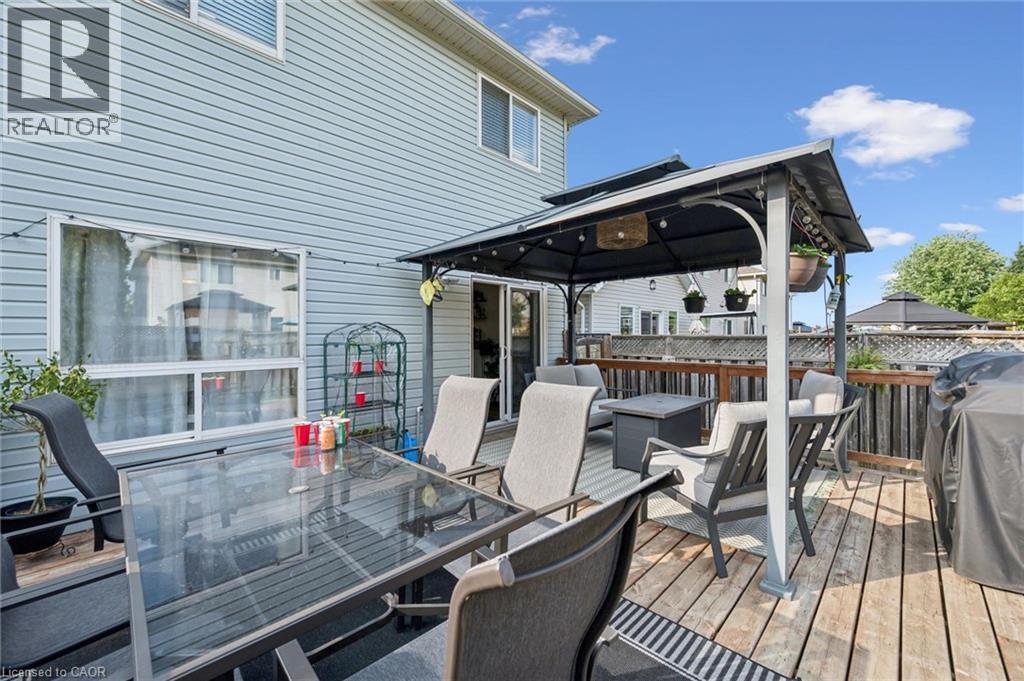 Expansive outdoor deck featuring wood-finish flooring - 765 Angler Way, Waterloo, ON
