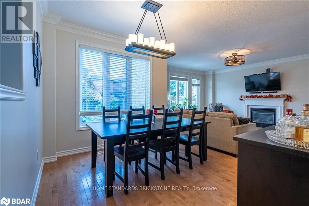 53 Graihawk Drive, Barrie, ON - Indoor Photo Showing Dining Room With Fireplace