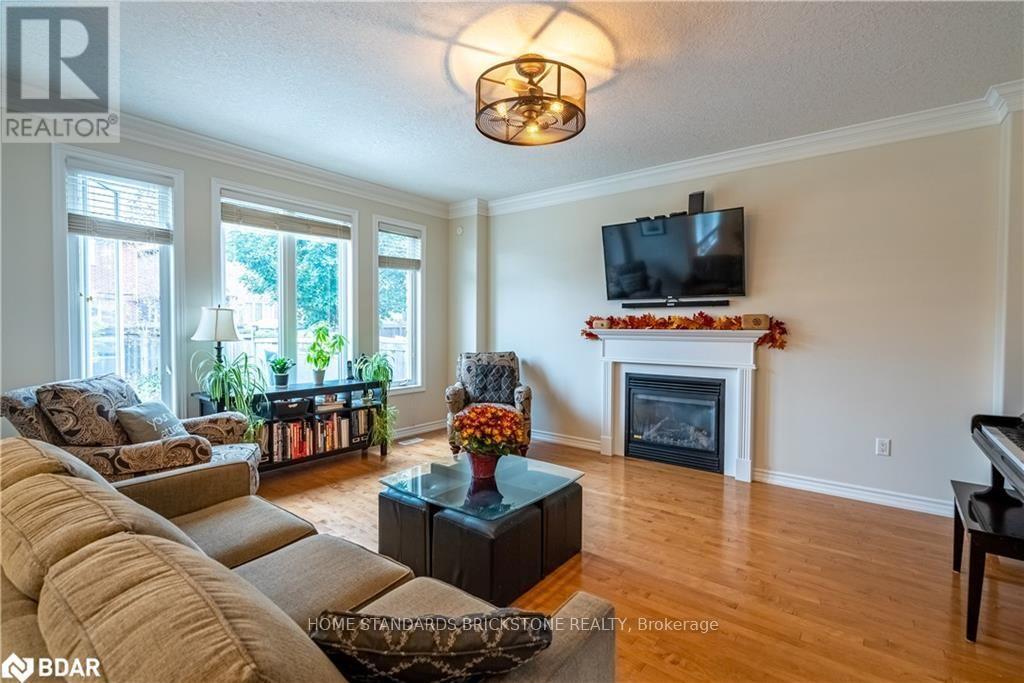 53 Graihawk Drive, Barrie, ON - Indoor Photo Showing Living Room With Fireplace