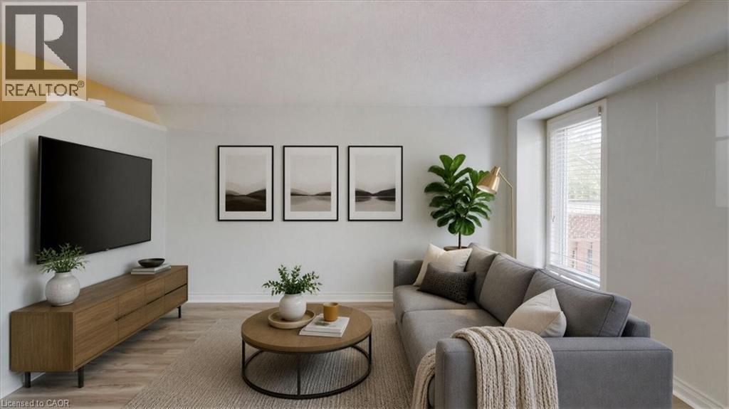 Living area featuring wood-finish flooring, a contemporary media console, and a window with white blinds - Virtually staged - 980 Creekside Drive, Waterloo, ON - Indoor Photo Showing Living Room
