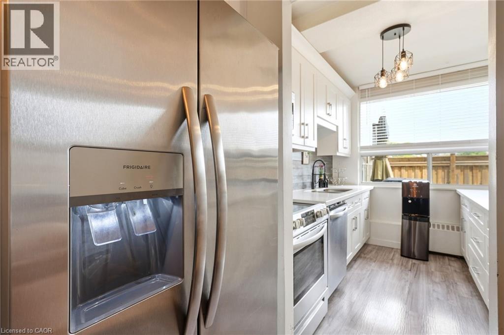 Stainless steel refrigerator with a built-in ice and water dispenser - 15 Nicklaus Drive Unit# 17, Hamilton, ON