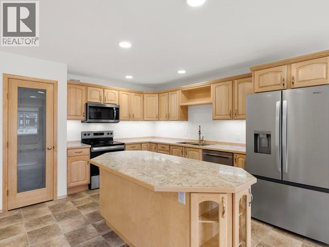 53 Wyvern Avenue, Whitehorse, YT - Indoor Photo Showing Kitchen With Double Sink