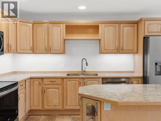 53 Wyvern Avenue, Whitehorse, YT - Indoor Photo Showing Kitchen With Double Sink