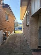Path to separate basement entrance - 