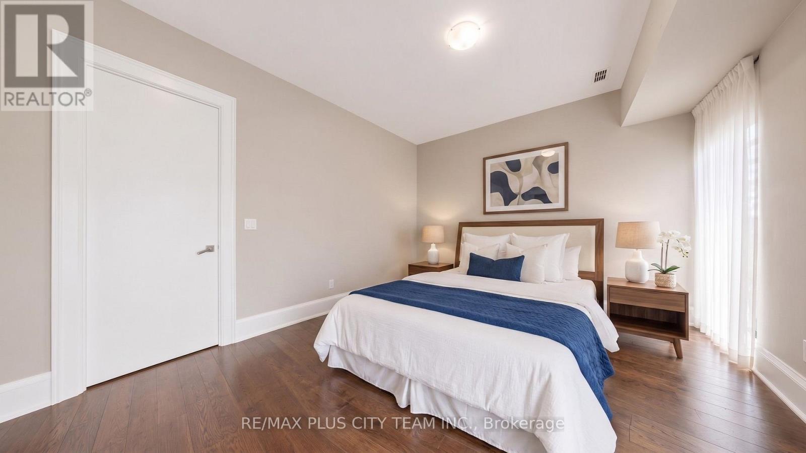 Virtually Staged Primary Bedroom - Th122 - 29 Queens Quay E, Toronto, ON