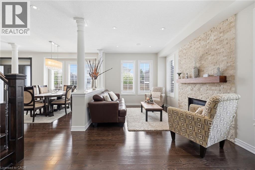 4645 Doug Wright Drive, Burlington, ON - Indoor Photo Showing Living Room With Fireplace