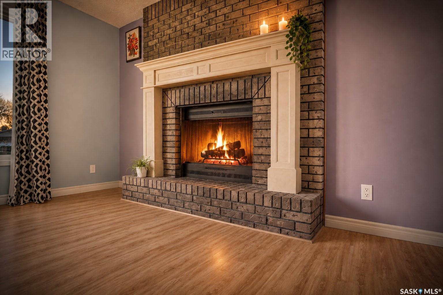 22 Edelweiss Crescent, Moose Jaw, SK - Indoor Photo Showing Living Room With Fireplace