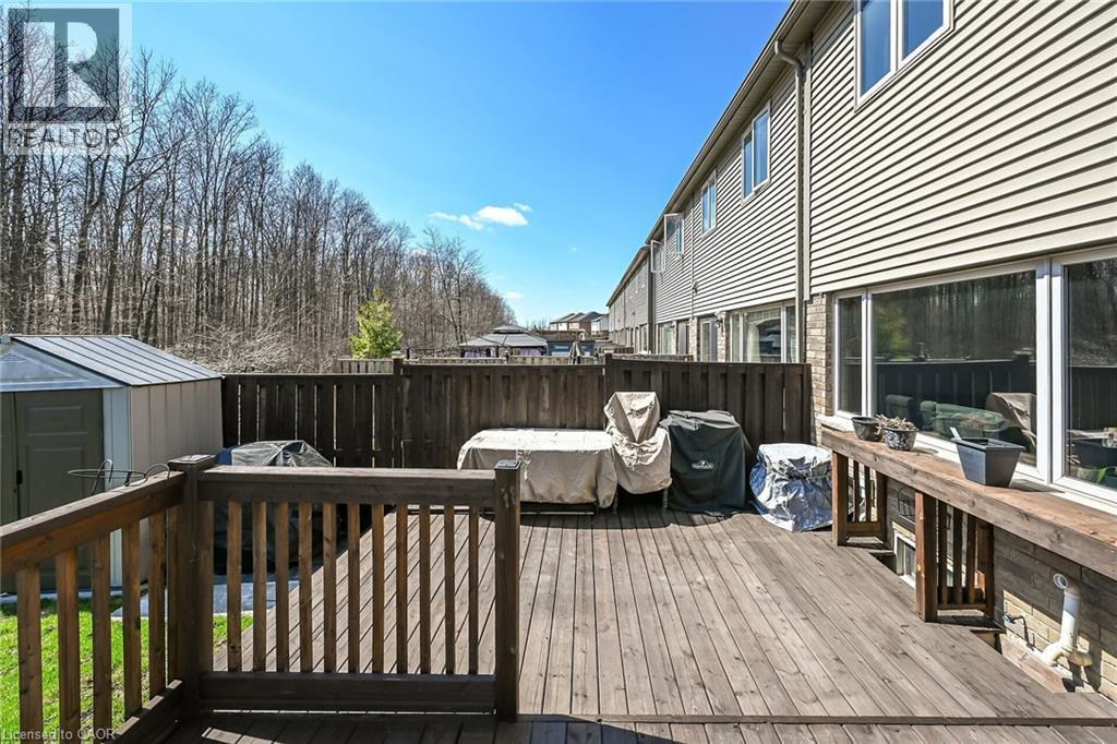 Outdoor deck space featuring wood-finish decking and railing - 149 Kinsman Drive, Binbrook, ON