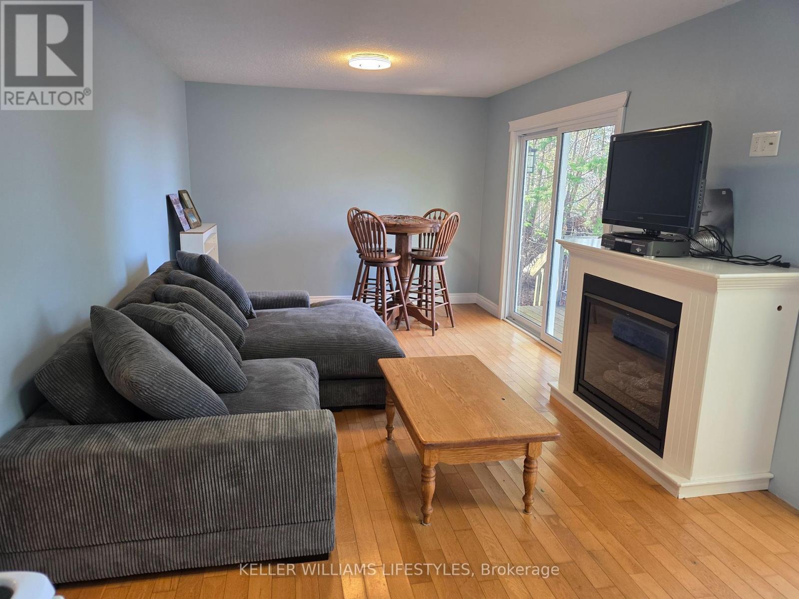 78113 Tall Timbers Street, Central Huron (Goderich), ON - Indoor Photo Showing Living Room With Fireplace