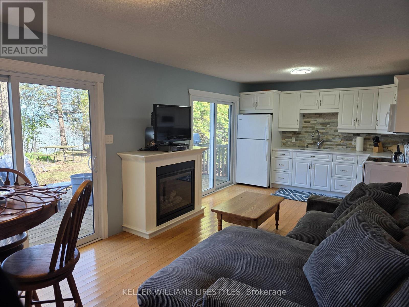 78113 Tall Timbers Street, Central Huron (Goderich), ON - Indoor Photo Showing Other Room With Fireplace