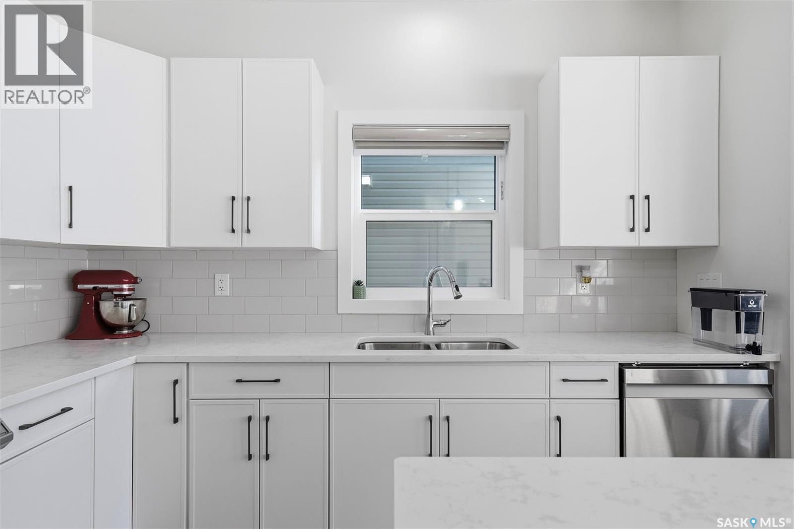 319 Skopik Crescent, Saskatoon, SK - Indoor Photo Showing Kitchen With Double Sink
