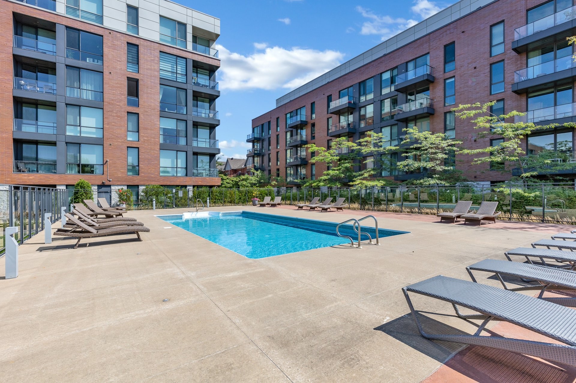 Exterior - 404-2200 Rue Harriet-Quimby, Montréal (Saint-Laurent), QC - Outdoor With In Ground Pool With Balcony
