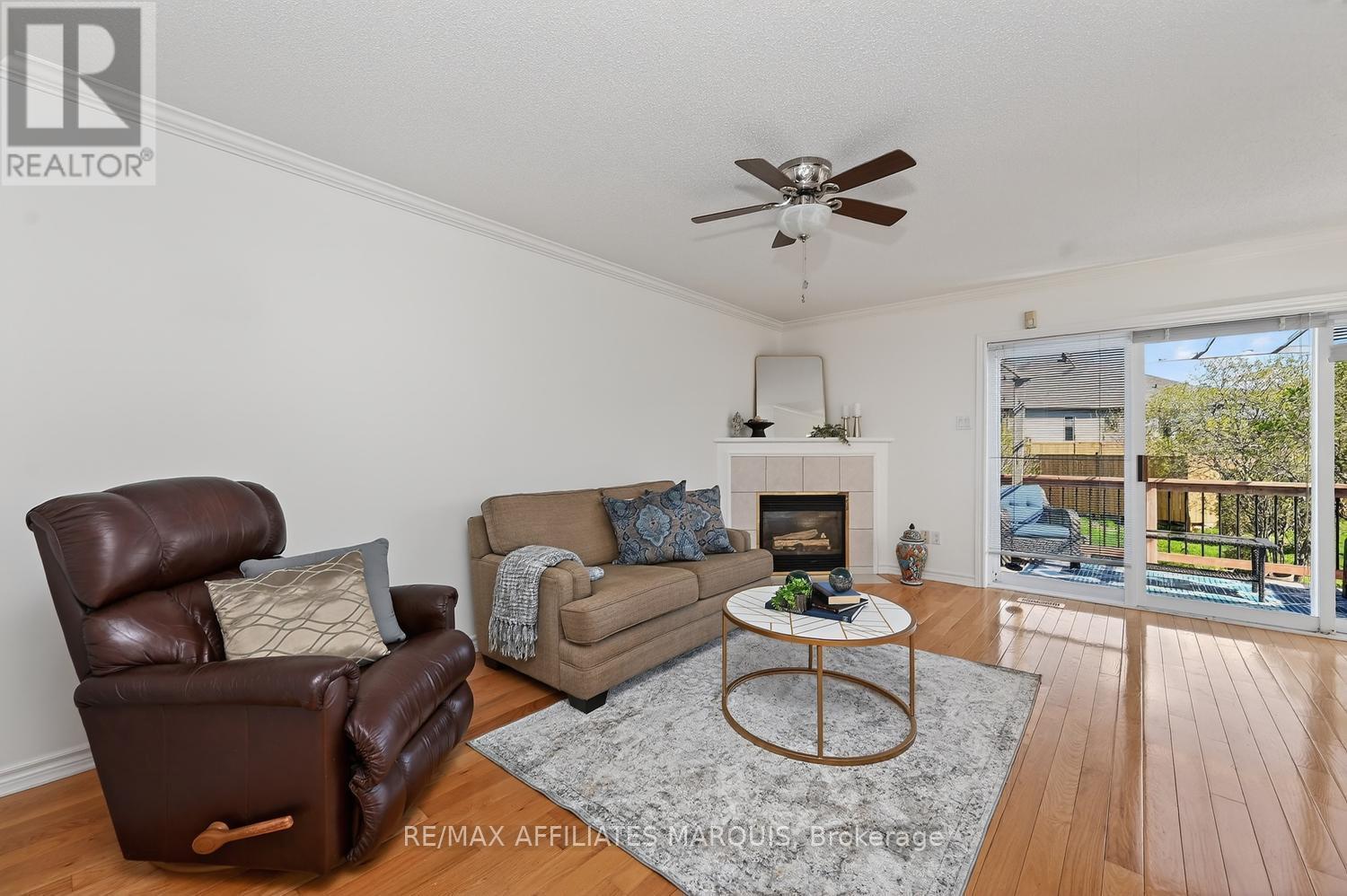 11 Decaria Boulevard, Perth, ON - Indoor Photo Showing Living Room With Fireplace
