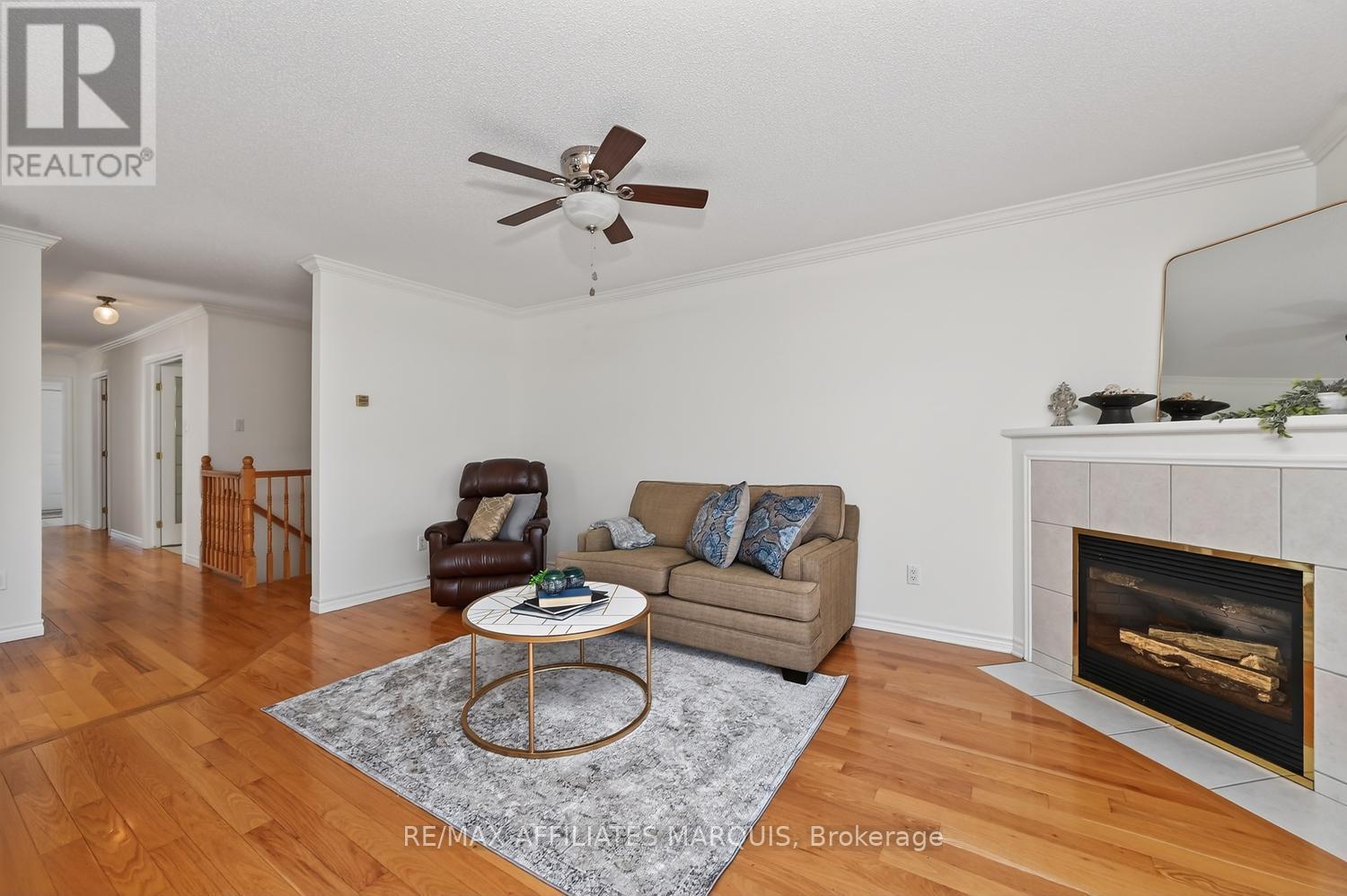11 Decaria Boulevard, Perth, ON - Indoor Photo Showing Living Room With Fireplace
