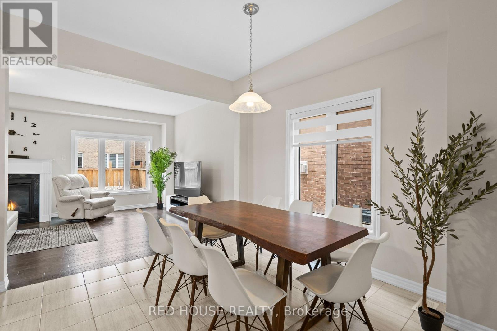 46 Dolobram Trail, Brampton, ON - Indoor Photo Showing Dining Room With Fireplace