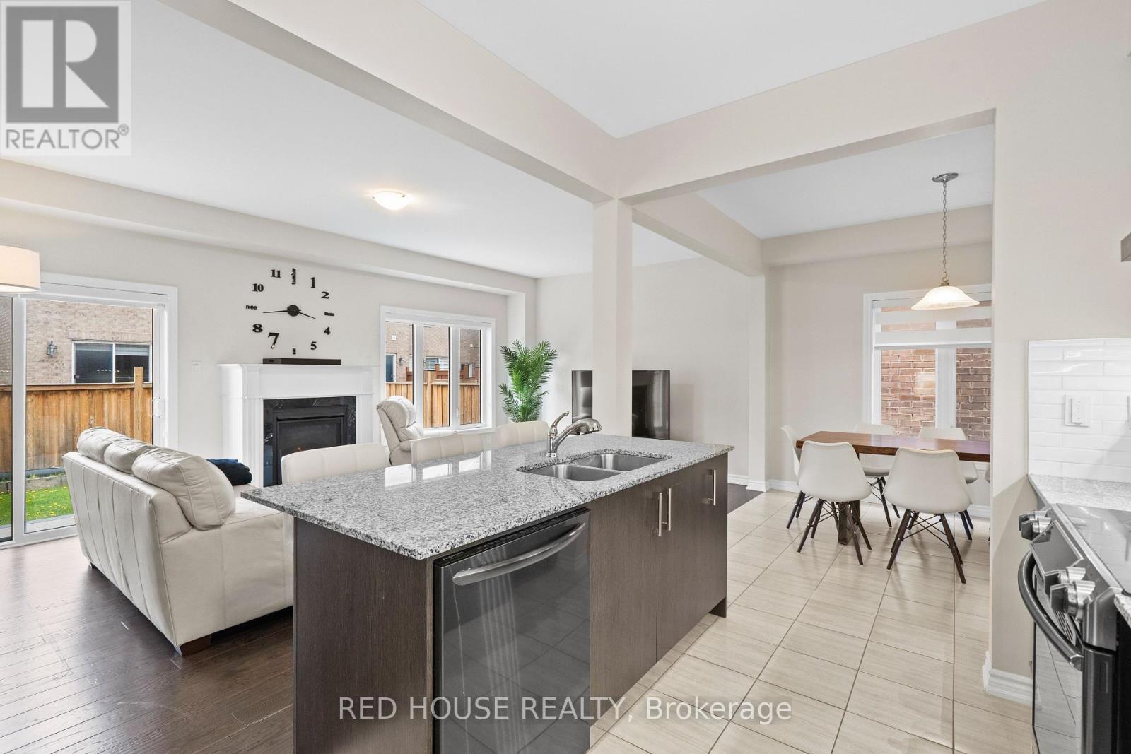 46 Dolobram Trail, Brampton, ON - Indoor Photo Showing Kitchen With Fireplace With Double Sink