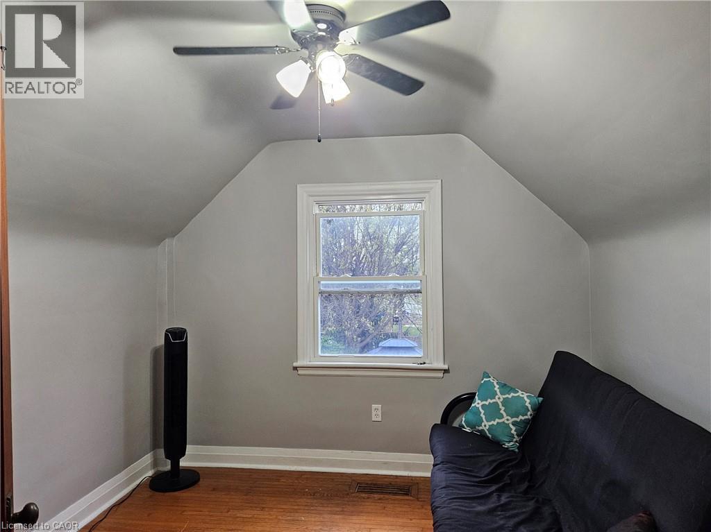 Attic room with sloped ceilings and a single window - 75 Barons Avenue S, Hamilton, ON - Indoor Photo Showing Other Room