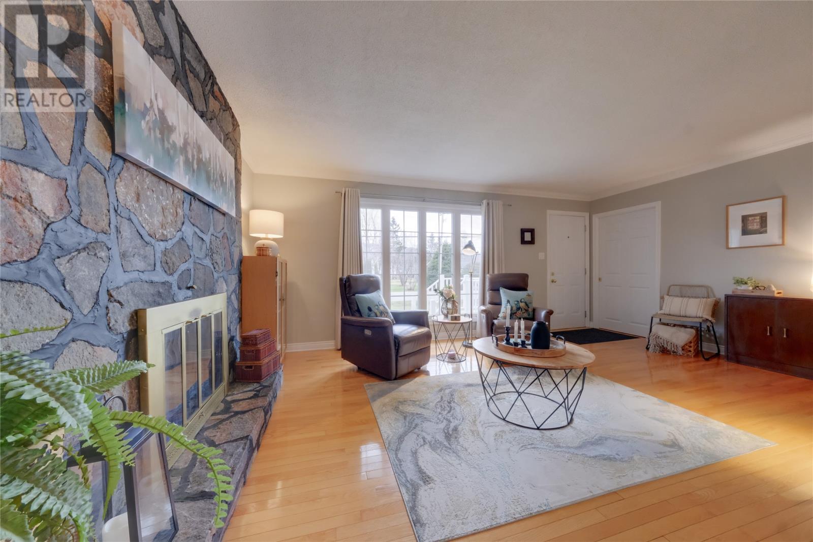 91 Midland Row, Pasadena, NL - Indoor Photo Showing Living Room With Fireplace