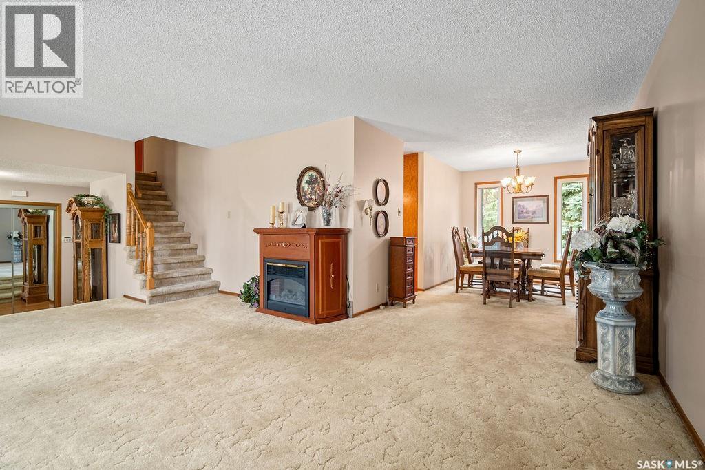 287 Hodgins Crescent N, Regina, SK - Indoor With Fireplace