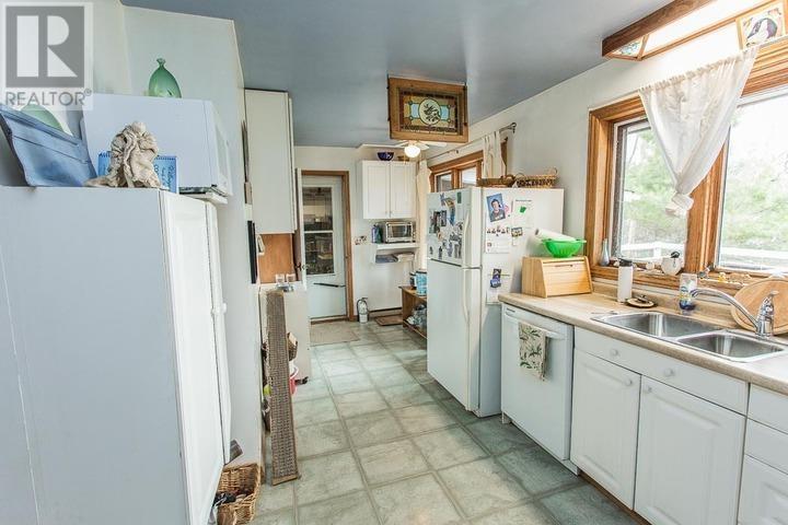 103 Birch Point Dr|Laird Township, Echo Bay, ON - Indoor Photo Showing Kitchen With Double Sink