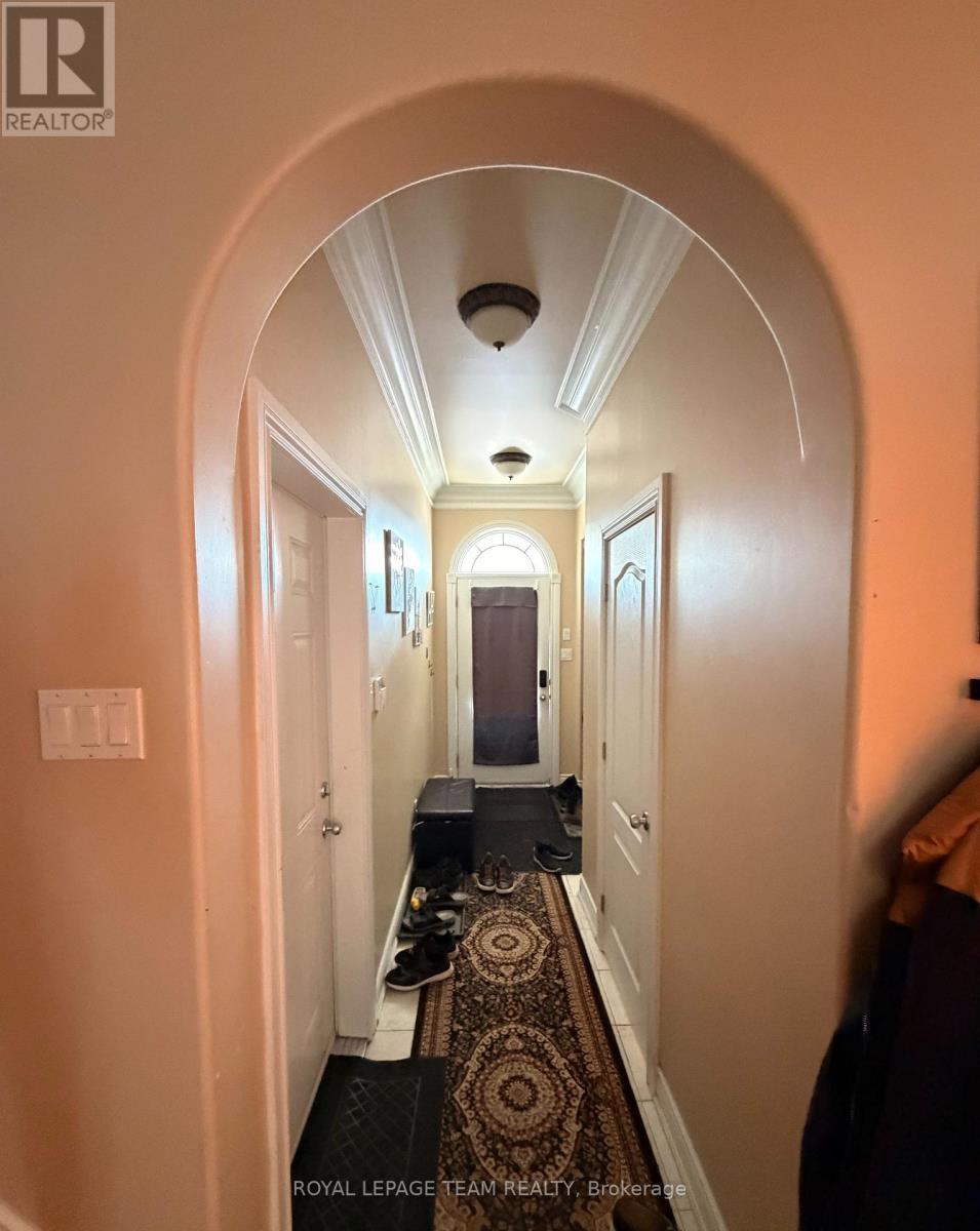 Inside entry from garage + 2 PC Powder Room - 1221 Anoka Street, Ottawa, ON - Indoor Photo Showing Other Room