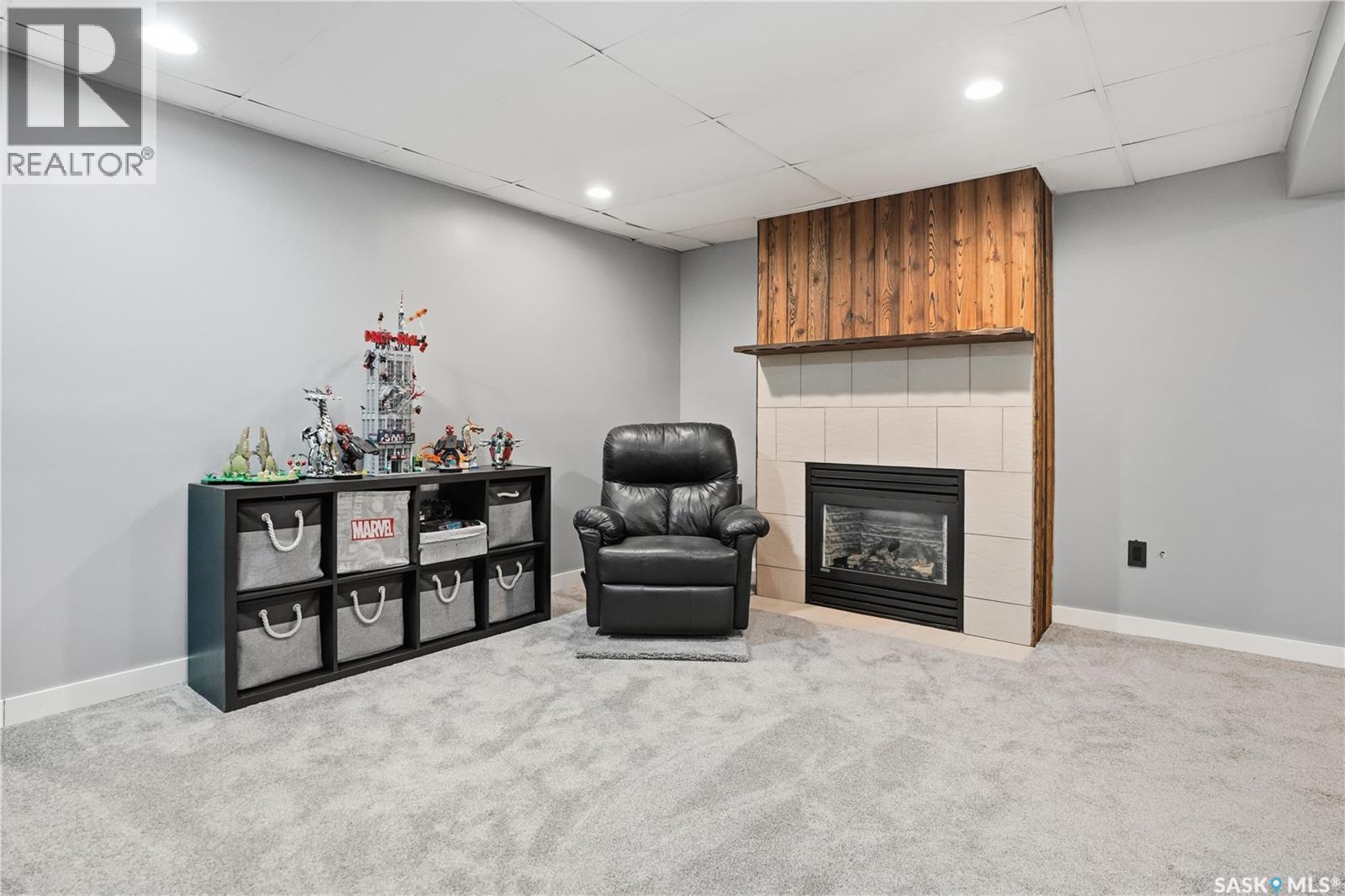245 Orchard Crescent, Regina, SK - Indoor With Fireplace