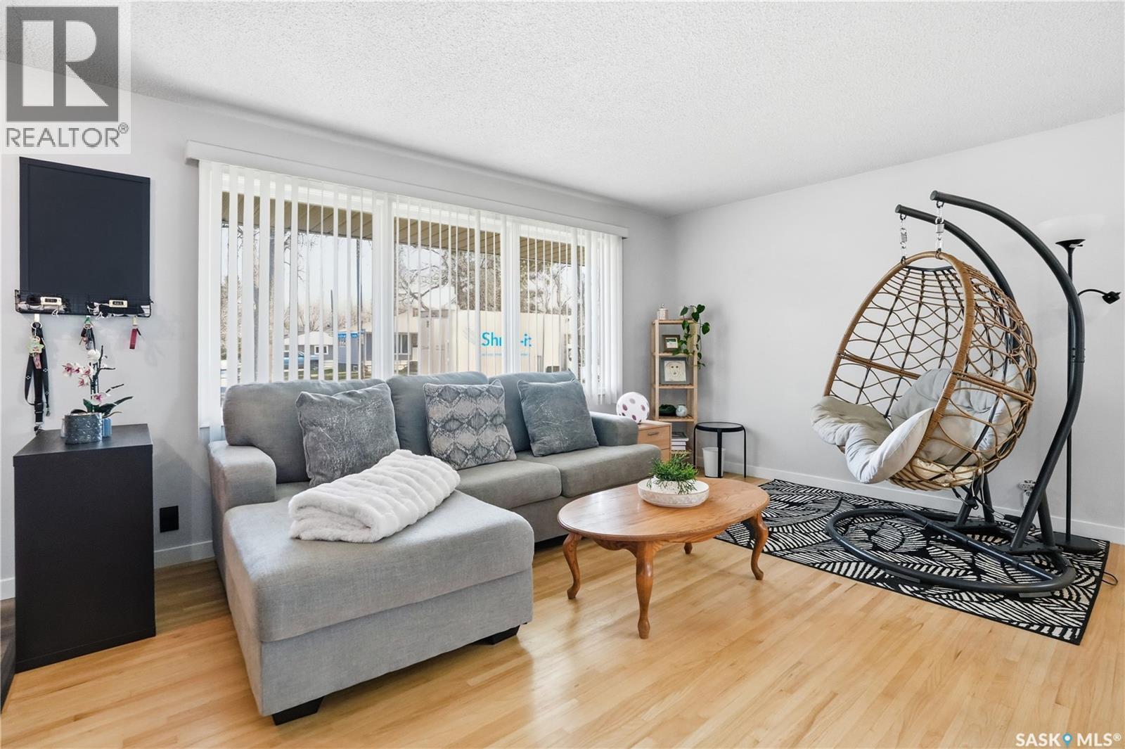 245 Orchard Crescent, Regina, SK - Indoor Photo Showing Living Room