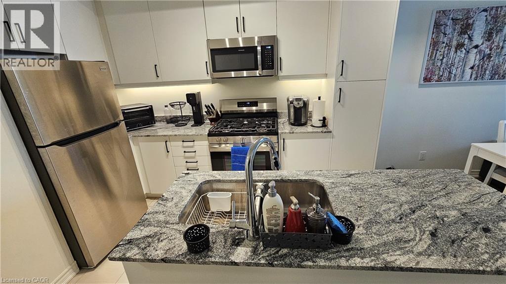5 Spooner Crescent Unit# 314, Collingwood, ON - Indoor Photo Showing Kitchen With Stainless Steel Kitchen With Double Sink